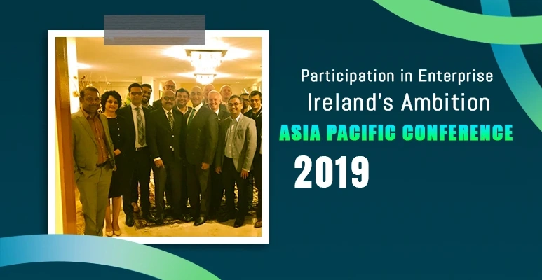 Group of conference attendees posing for a photo at Ireland's Ambition Asia Pacific Conference 2019 with a formal setting in the background.